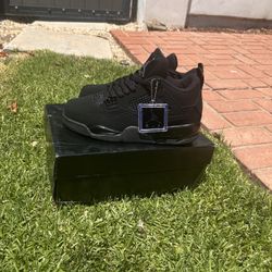 Black cat Jordan 4s