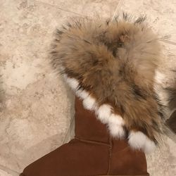 Real sheep skin plus real Fox fur on the outside size 8-9 female