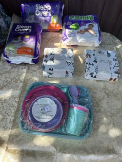 Kids Diapers And Baby’s Crib Sheet And Kids Dinnerware Set