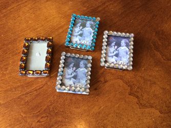 4 small picture frames. For $2
