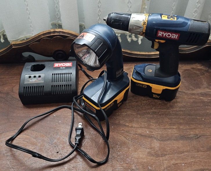 Ryobi Drill And Light And Charger
