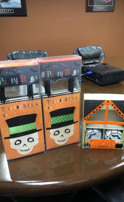 Halloween bags and 24 cupcake holders. available