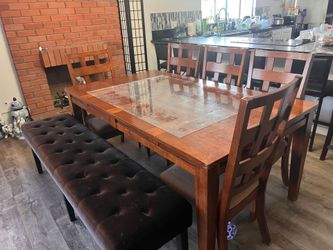 Dinning Table in Rose Wood.