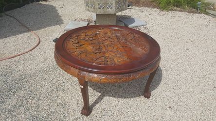 Asian wood carving table. 40"
