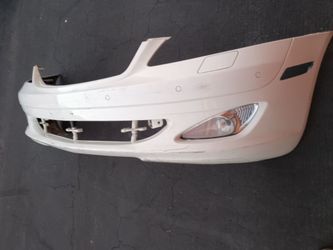 2007-2009 Mercedes S550 complete front bumper with All the accessories and parking assistance sensors and inner fillers with accessories OEM.