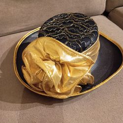 Cute vintage hat. Black with gold  bow