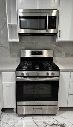 GE Stove used and Samsung Microwave new. Good looking together.