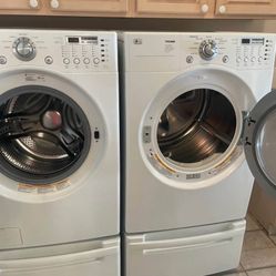 LG 3.83 CuFt Ultra Large Front Washer & 7.4 CuFt Ultra Capacity Gas Dryer with Pedestals