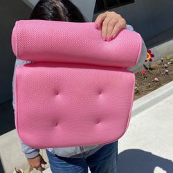 Bathtub pillow with suction cups.