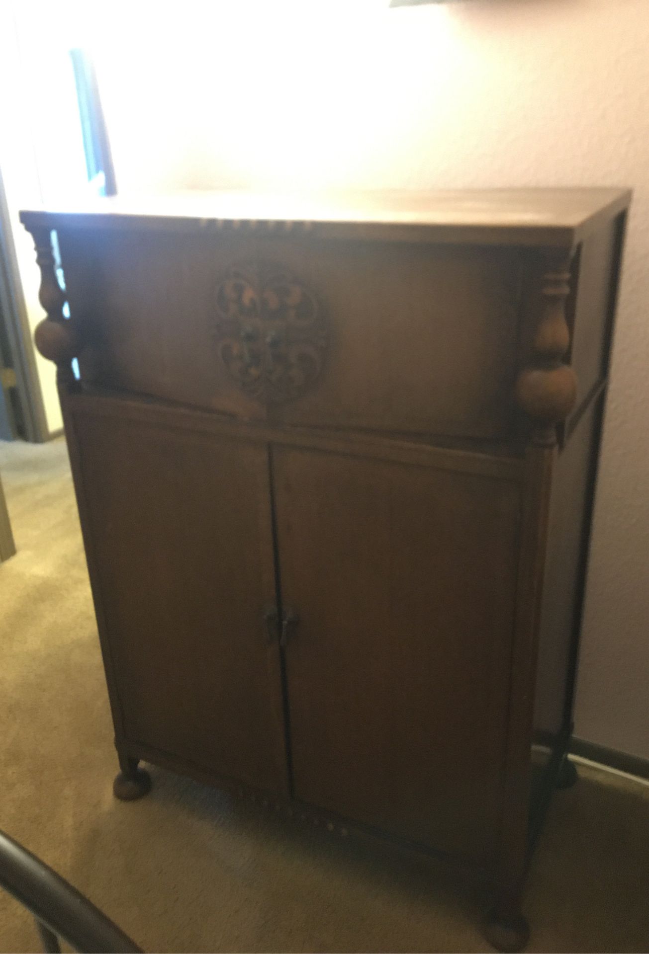 Antique Tall Dresser with hidden drawers and clothes hanger