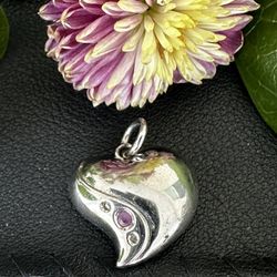 Sterling Silver High Polished Puffed Heart Pendant with Rhinestone accents Pre Owned.