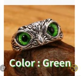 Owl ring with green eyes