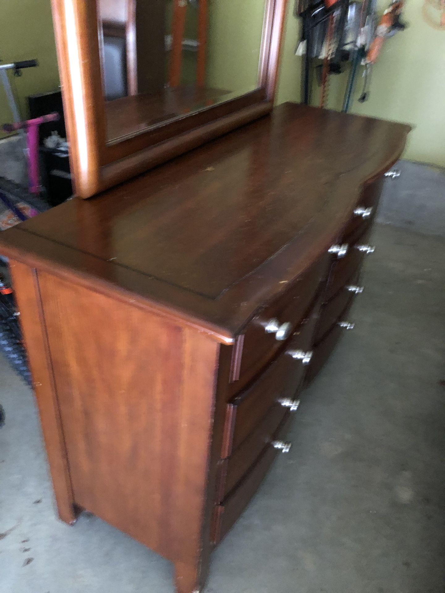 Junior’s twin wooden bed with dresser