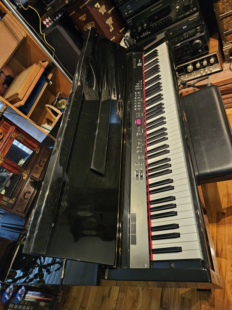 Mini Grand piano  WILLIAMS
 $500