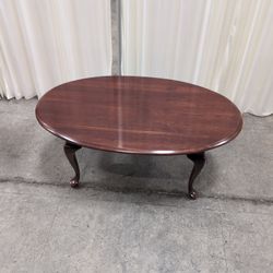 Dark Cherry Oval Wood Coffee Table with Cabriole Legs
