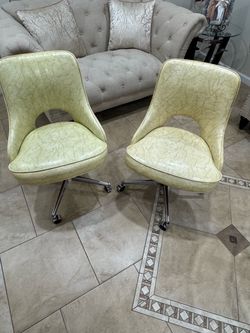 Pair of Vintage Swivel Chairs on Casters