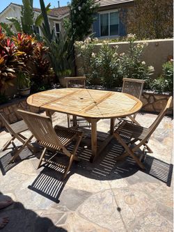 Teak 67in expandable table/5 chairs plus 2 Steamer lounge chairs