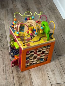 B. toys Zany Zoo Wooden Activity Cube
