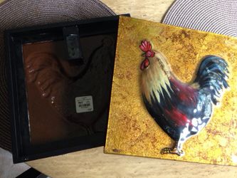 Pier 1 rooster wall decor...flipped one so you can how much I paid for them which was $40. Will sell for $15 no lower