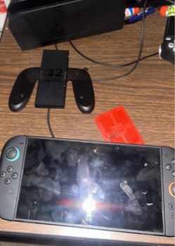 Nintendo Switch 2 plus 2 games bearly used with accessories