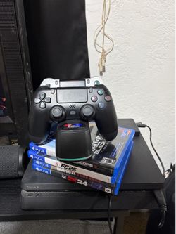 PS4 with 2 controllers & games