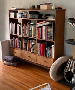 MCM walnut bookcase w shelves and 3 drawers