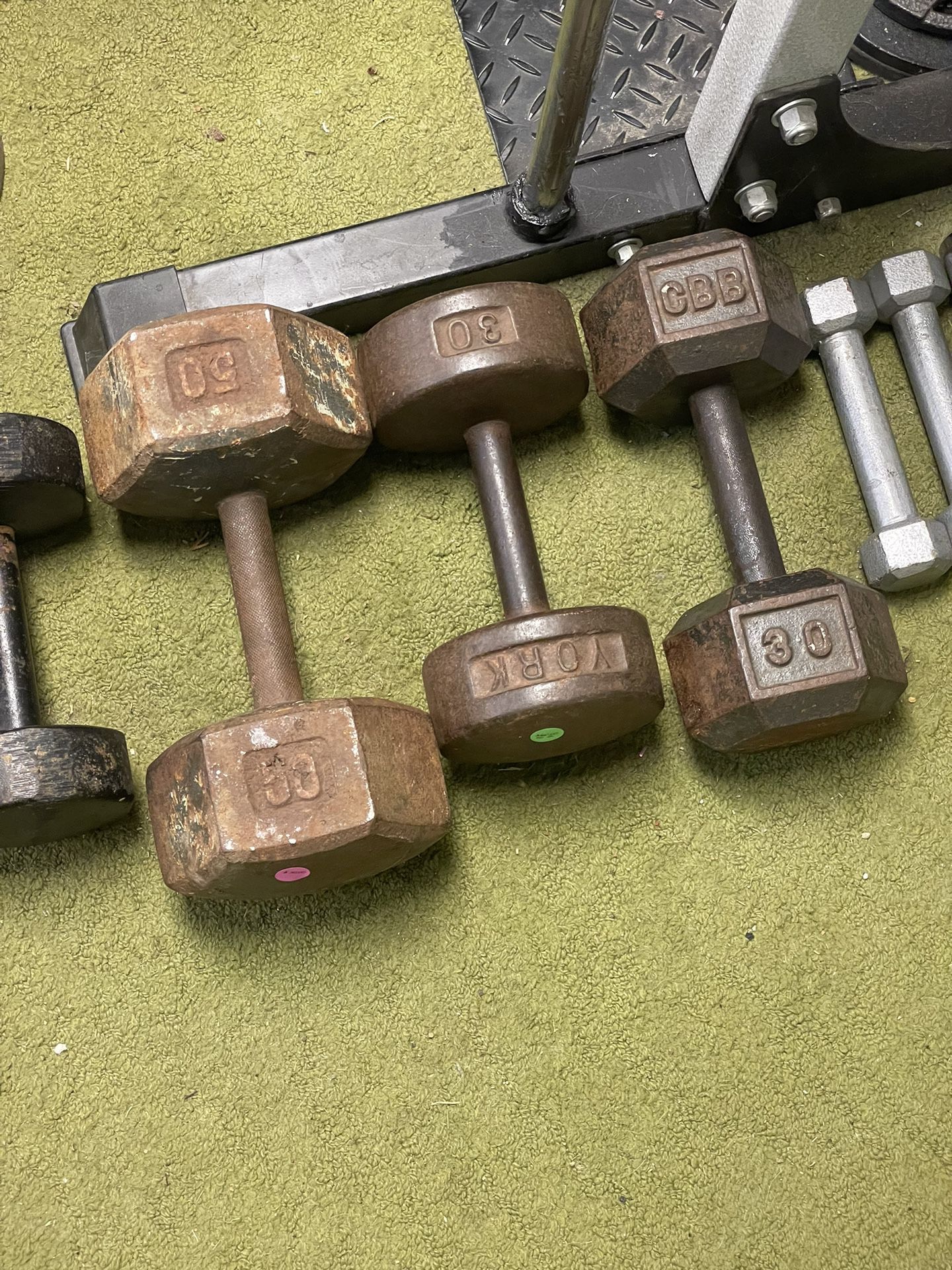 Dumbbell weights for sale. I have 50 pounds and 230s and one20 a $ a pound for each of them.