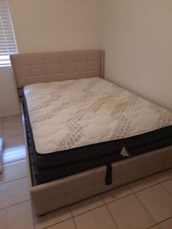 Queen size bed  left up mattress for storage