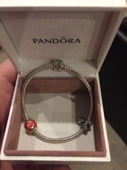 Pandora bracelet & 2 retired charms never used