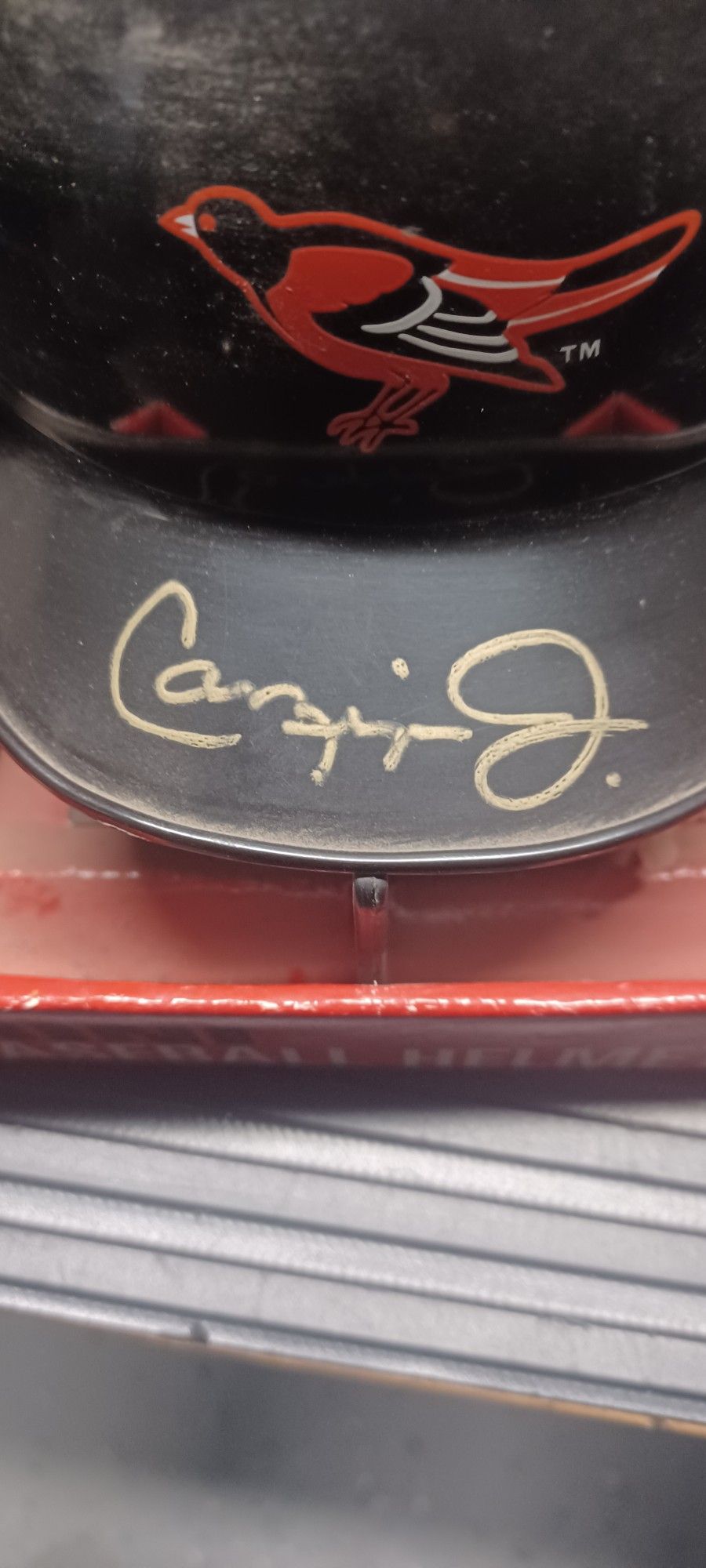 CARL RIPKEN JR AUTOGRAPHED BASEBALL MINI HELMET WITH COA