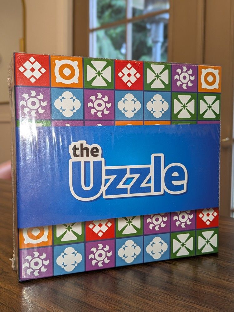 The Uzzle Board Game - Brand New Still Sealed