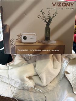 E1 Mini Full Sealed HD 1080p Projector 