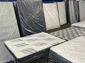 New Mattresses in Plastic Wrap