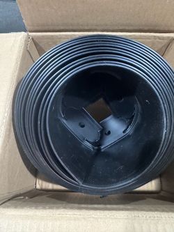 Black plastic edging with ridged texture