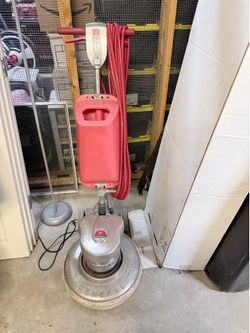 Floor stripping machine.