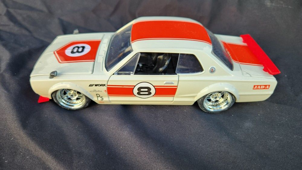JDM Tuners 1971 Nissan Skyline GT-R (KPGC10) Jada Toys METAL Tan/Red 1:24
