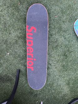 A skateboard  the colors are red and white