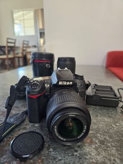 Nikon D7000 Camera Bundle-2 Nikon
VR Lenses, 3 Batteries & 64GB SD