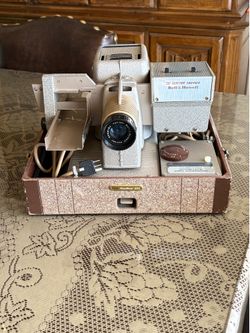 Vintage Bell & Howell TDC Headliner 303 slide projector from the 1950s