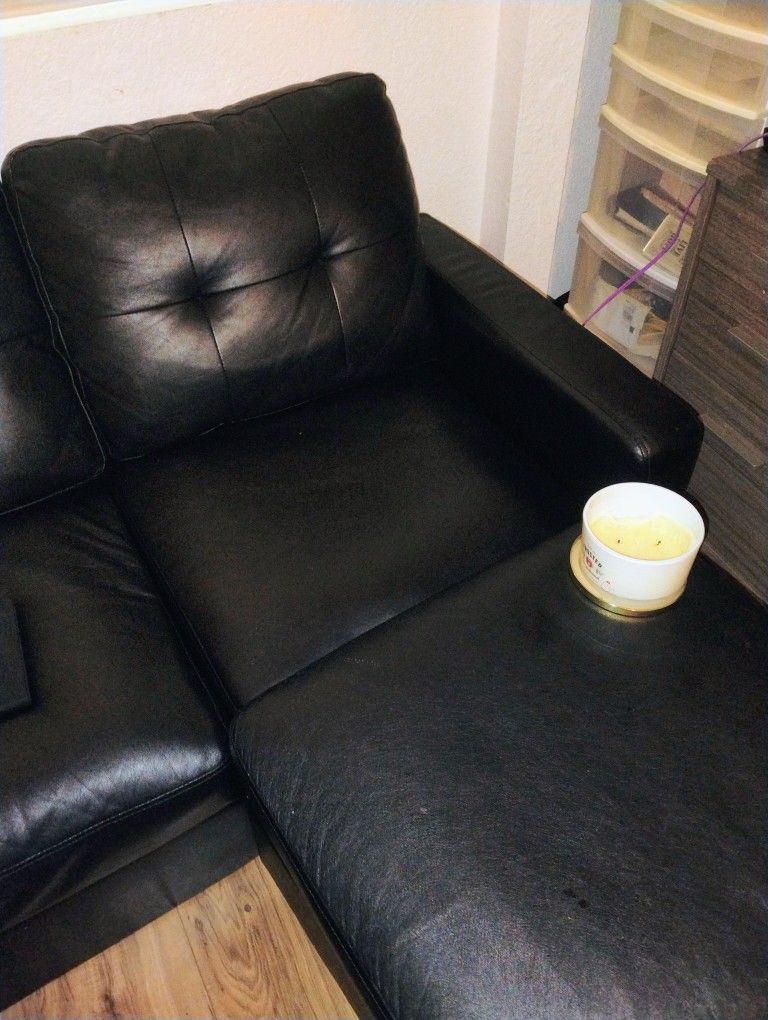 Nice Black Couch And OttomN