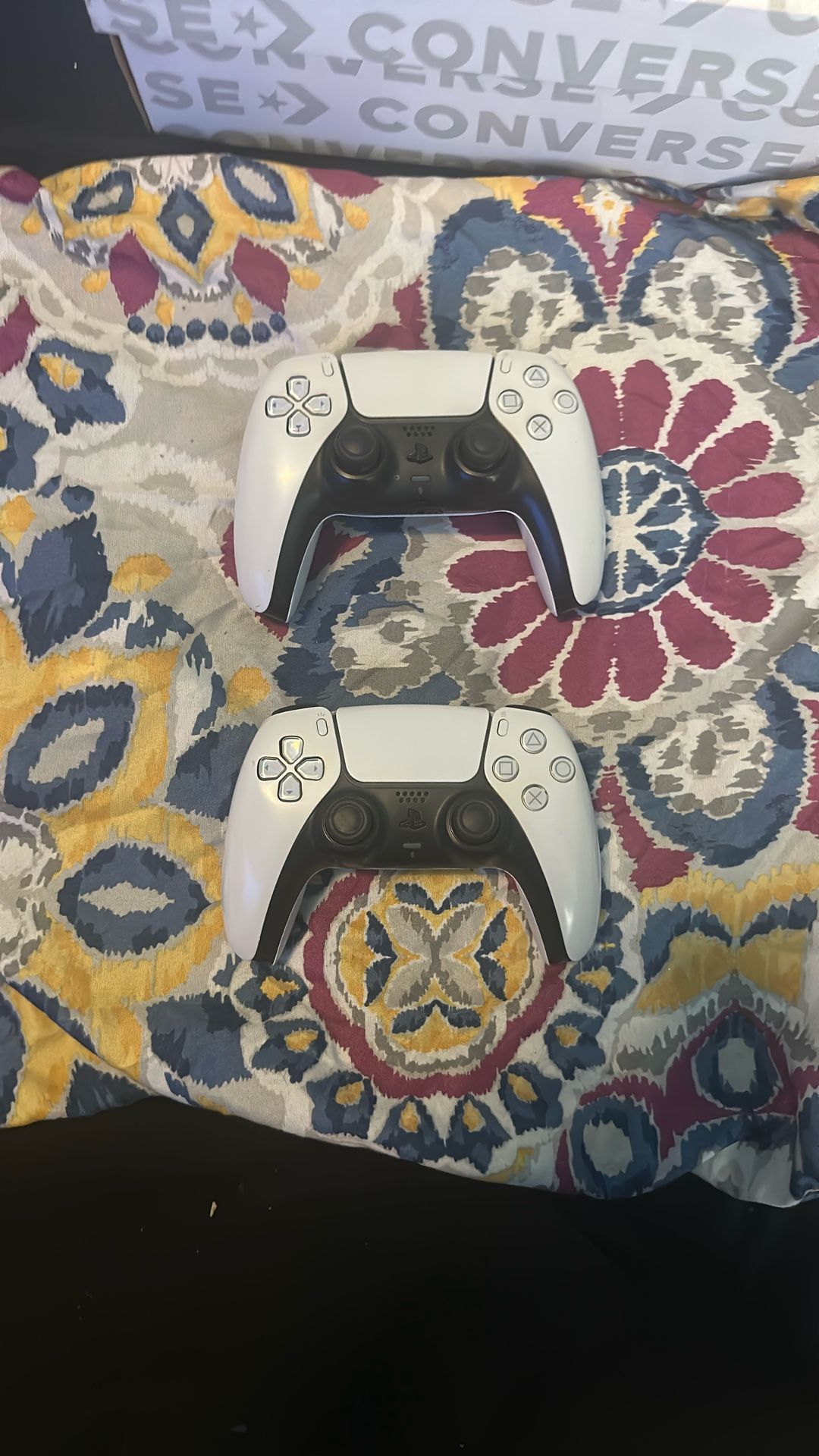 2 White PS5 controllers 