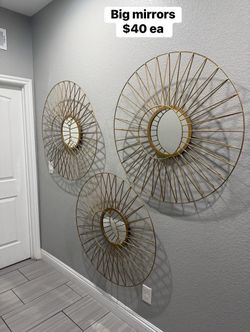 Gold sunburst wall mirrors