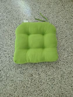 4 green patio cushions