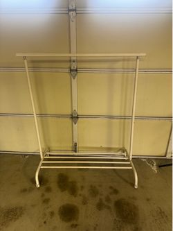 Small metal clothing wrack with wheels