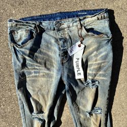 Purple distressed ripped denim jeans #distresseddenim