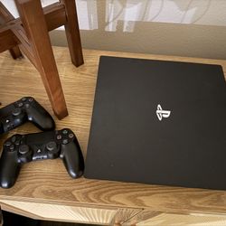 PlayStation 4 With Two Wireless Controllers