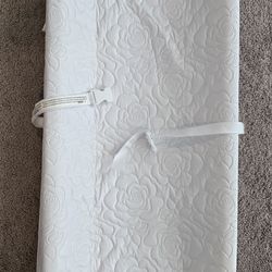 Colgate contoured changing pad