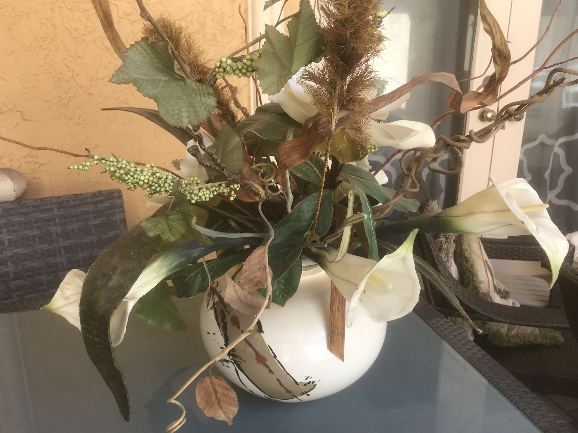 Artificial flower arrangement with porcelain vase