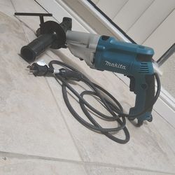 Makita

6.6 Amp 1/2 in. Corded Variable Speed Hammer Drill with Torque Limiter Side Handle Depth Gauge Chuck Key 

