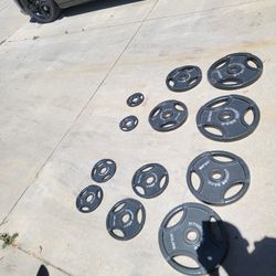 Lots Of Olympic Weights Available. 45s, 35s, 25s, 10s, 5s, 7 Ft Olympic Bar, And 30 And 40 Lb Dumbbells